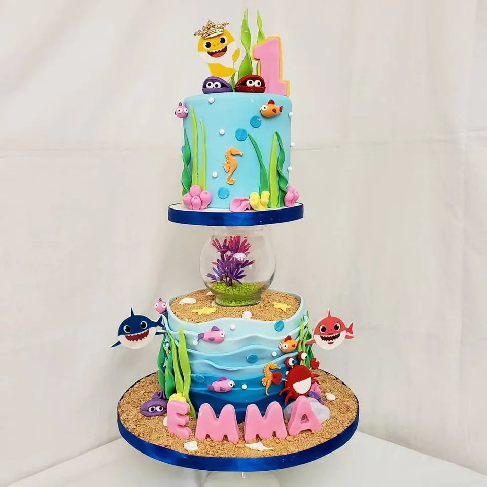 8. Baby Shark Birthday Party Cake Decorated With Toys — photo inspiration